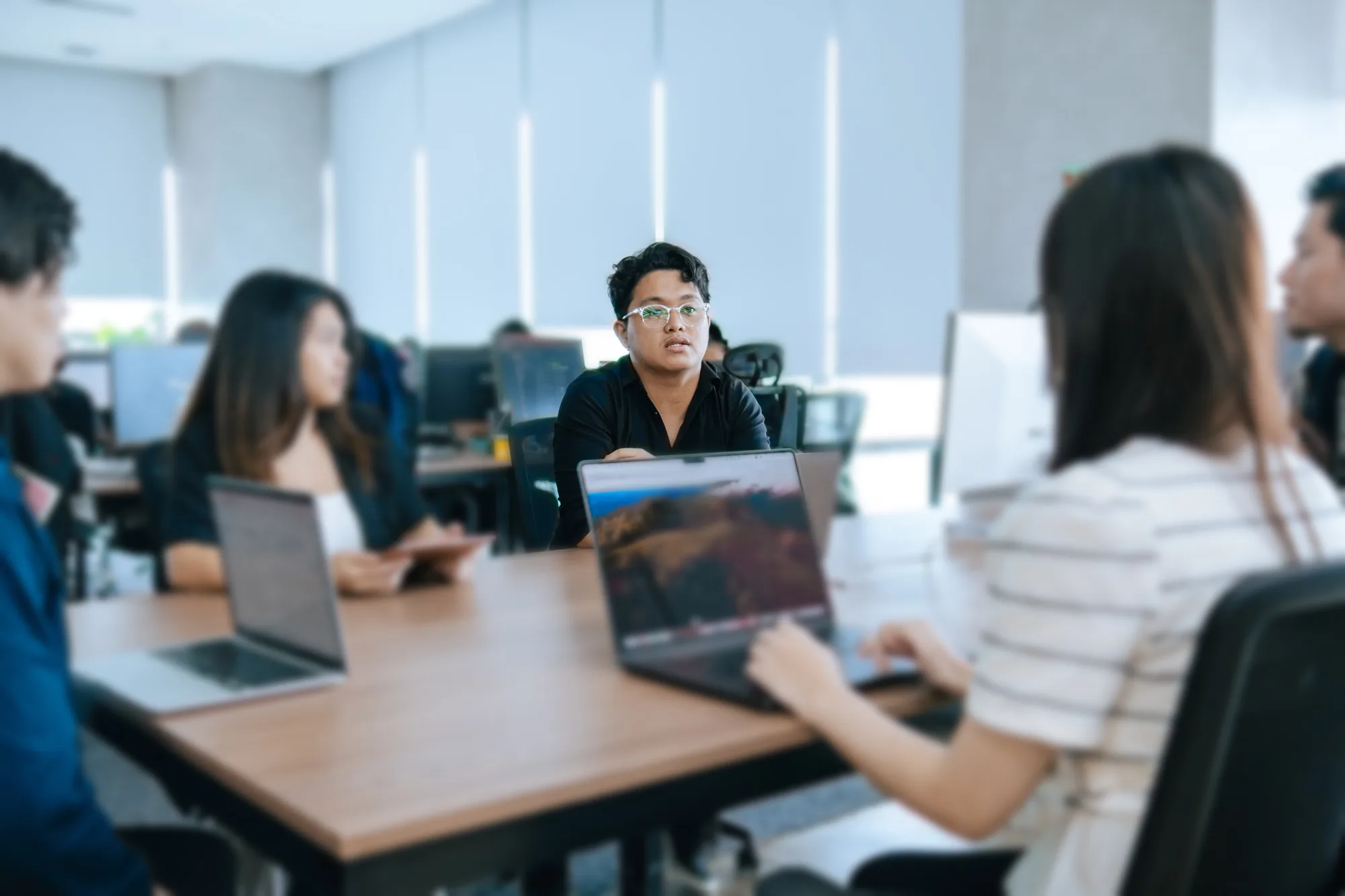 Working together around a laptop